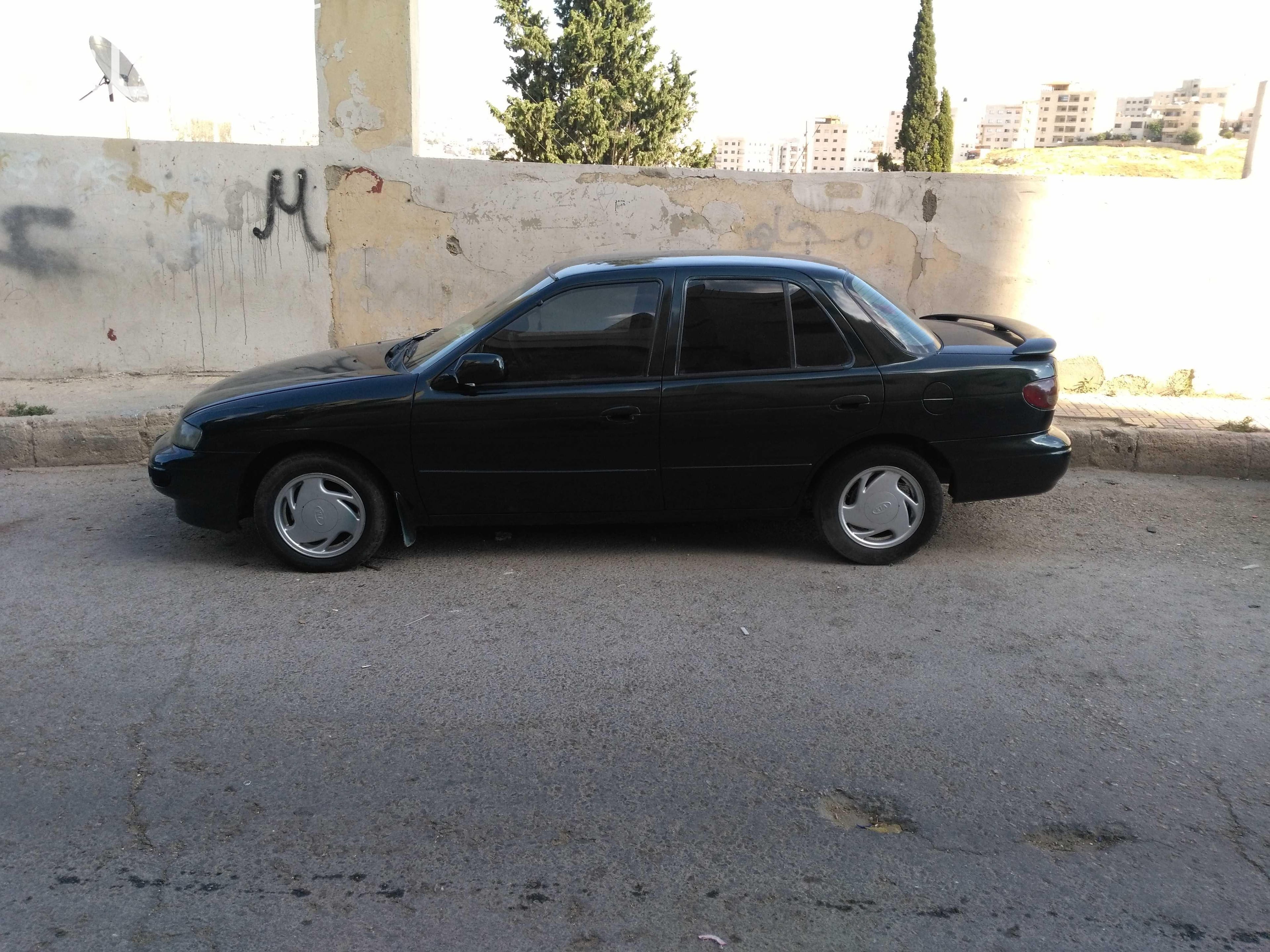 كيا سيفيا1مديل97 2جيدخلفي1 دقه ع راس امي شمال 1 مضرب امامي يمين السياره بصلاه ع نبي قير عادي مري كهربه مكيف حامي بارد مسجل سوني دهان جديد بس في ضربه خفيفه في الطمبون والجناح الخلفي يمين