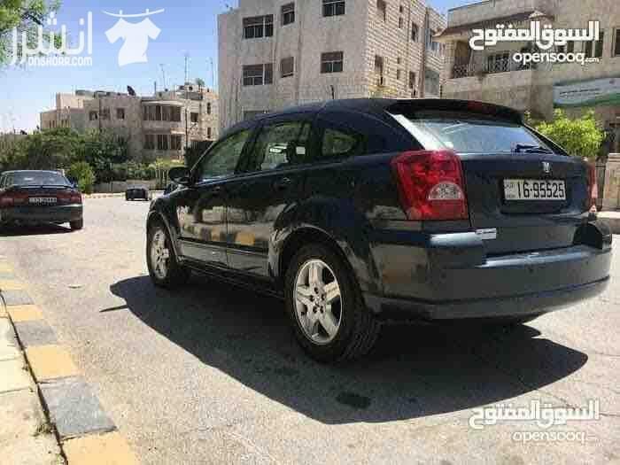 دودج كالبر الفحص 4 جيد ماتور 2000 سي سي جير اوتوماتيك لون فيراني مميز وضع السيارة توب نظافة صيانة كاملة من زيوت فلاتر بركات بواجي هيئة امامية خلفيو من صنوبرصات و كفات و عمدان توازن و جلود (لا...