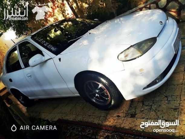 سياره اكسنت موديل ١٩٩٦ لون ابيض السياره ما شاء الله عليها فحصها ٣ جيد و دقه جير عادي ادهان جديد غرفه وكاله عليها جنط الطبون الامامي معدل hD السياره لعبه ما شاء الله للجادين فقط 0780385628 ال...
