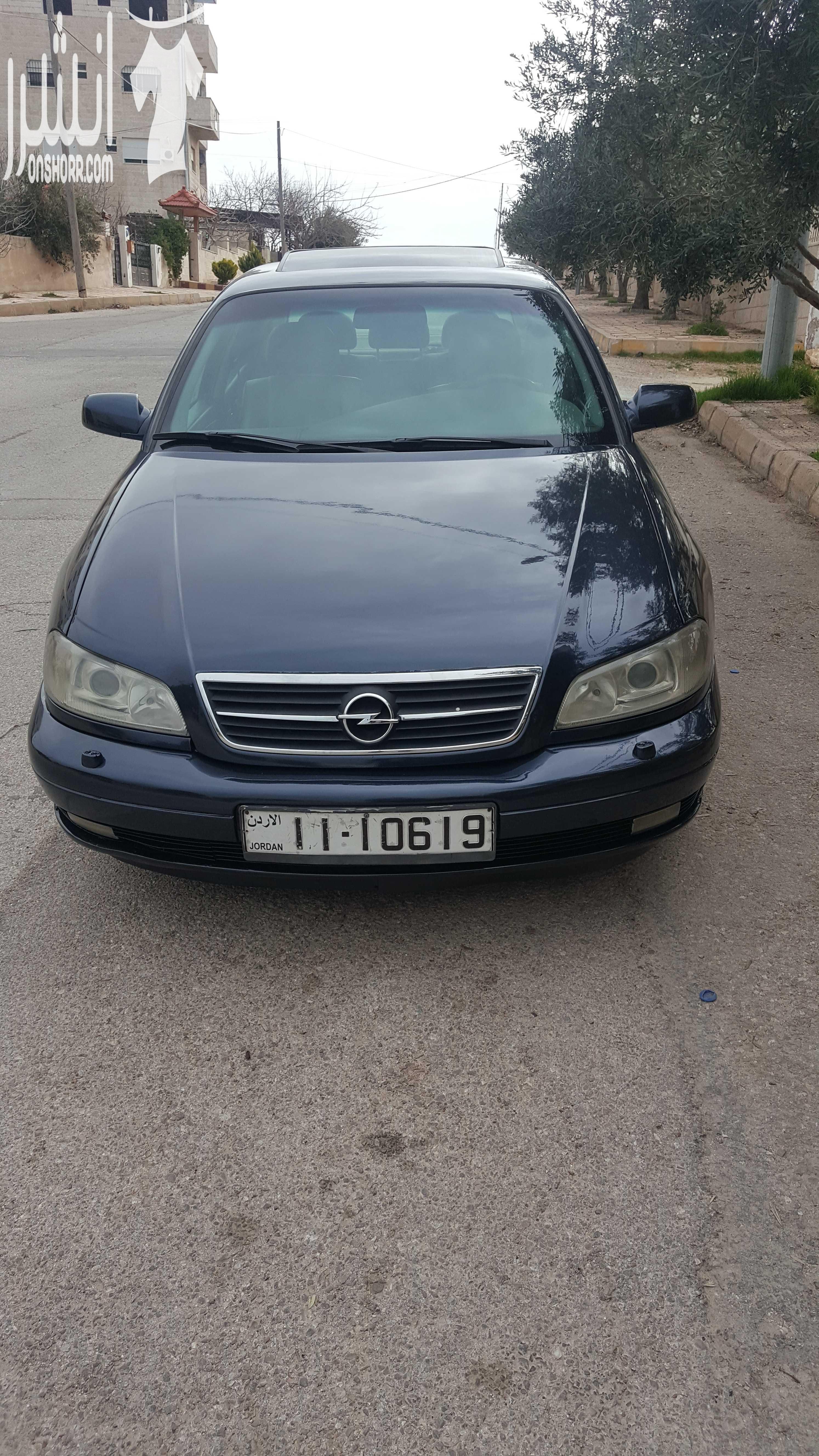 اوبل اوميغا موديل 2003 لون كحلي 2200سي سي ،جنط 17 اصلي، فتحة، حساسات خلفية اصلية، مثبت سرعة، مسجل philips مع سي دي تشينحر اصلي، تحكم طارة، اضوية زنون، نظام امان للاطفال و السرقة، فرش جلد، كراسي كهرب...