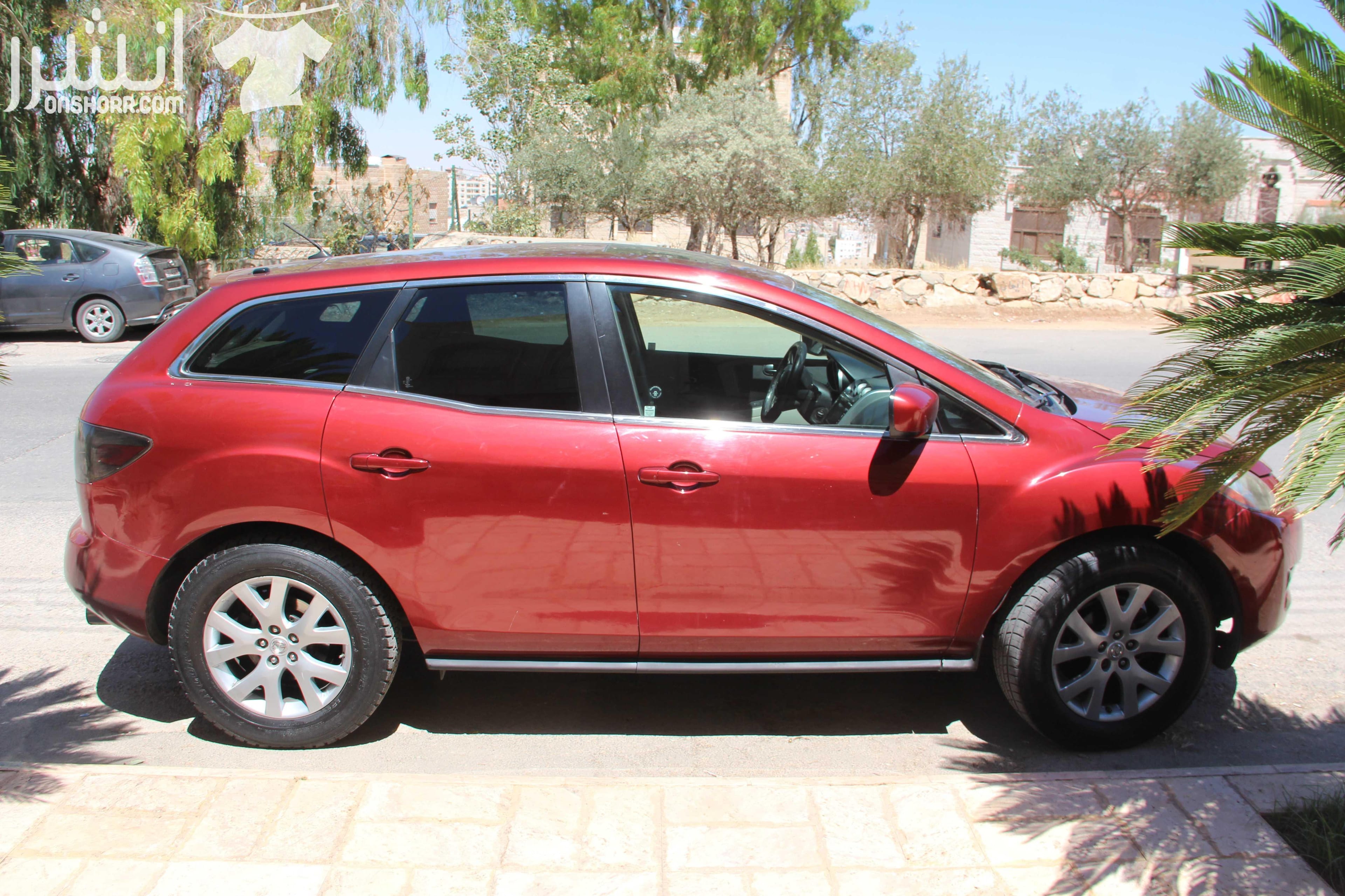 mazda cx7 2007 فحص كامل ليست بحاجة لاي صيانة ماتور اقتصادي 2300 تيربو نظام حقن وقود مانع انزلاق كراسي جلد مدفية فتحة شاشة اصلية 6 سي دي نظام صوت bois جنطات اصلية ترخيص 3/2019 للبيع فورا نقدا وليست اقس...